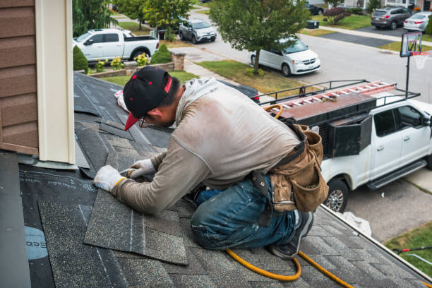 Professional Roof Installation technician working in Woodville, CA